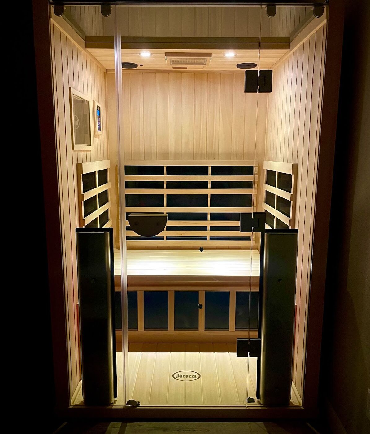 Two-person infrared sauna with warm wood interior